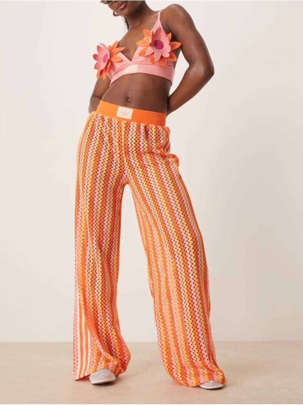 Women’s adidas Originals crochet track pants in pink and orange